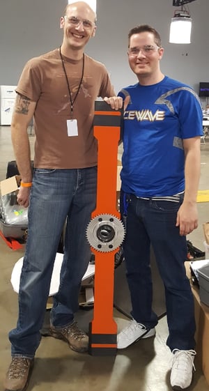 Swagelok Northern California's Neil Ide (left) with Team Icewave and battlebot