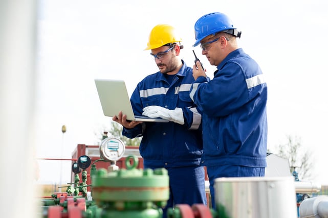 bigstock-Two-Workers-In-The-Oilfield-O-255552700 (1)